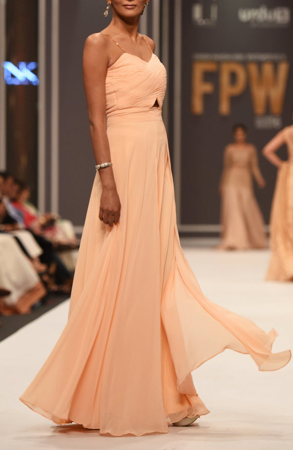 Peach draped dress.