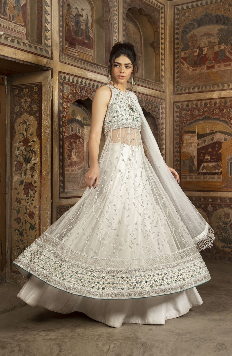 jamawar dress design This beautiful design is a perfect example of elegance and royalty. Net kalidaar frock in fully hand embellished work paired with a jamawar lehnga and organza dupatta perfect to style