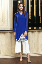 Blue tunic with embroidery.